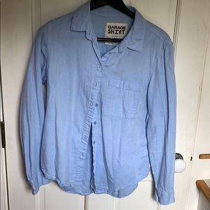Size medium light blue button down